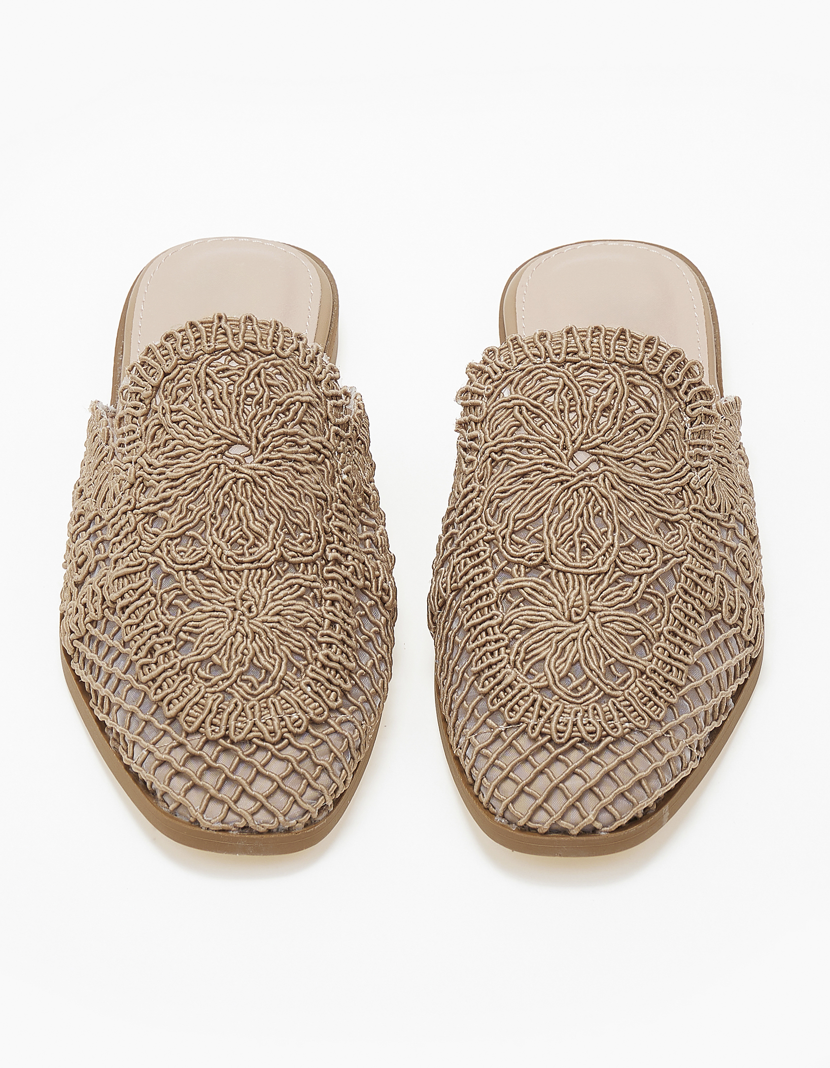 Φλατ mules με πλεκτό σχέδιο - Πούρο φωτογραφία