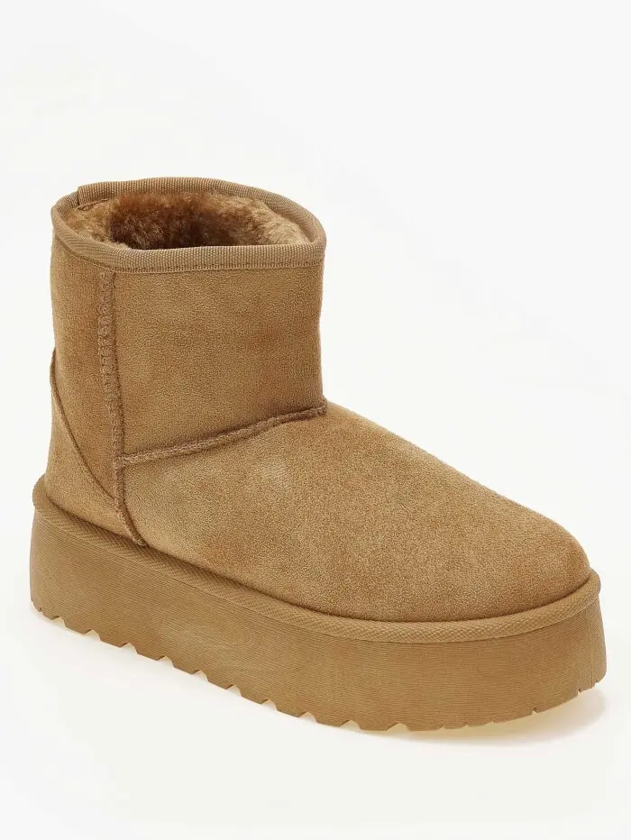 Μποτάκια με γούνα και ψηλή σόλα
